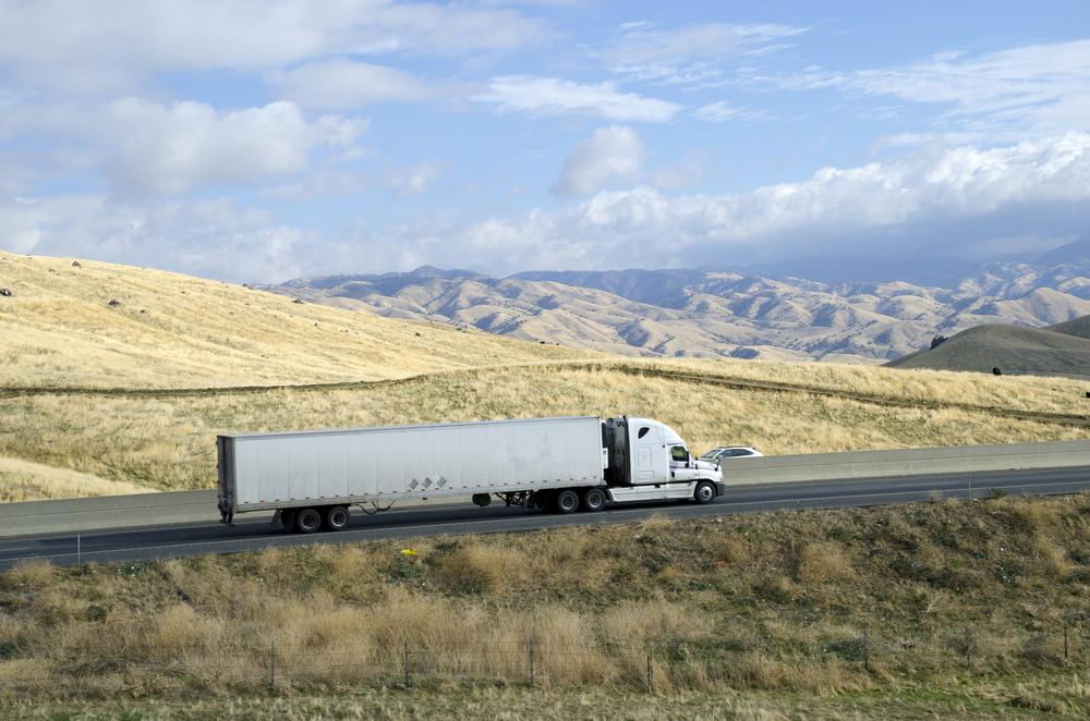 a,large,semi,trailer,rig,hauls,a,load,from,california